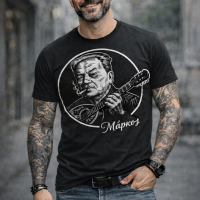 ΜΑΥΡΗ ΜΠΛΟΥΖΑ ΚΟΝΤΟΜΑΝΙΚΗ ΑΝΔΡΙΚH ΜΕ ΣΧΕΔΙΟ ΜΑΡΚΟΣ ΕΜΠΝΕΥΣΕΜΕΝΟ ΑΠΟ ΤΟΝ ΜΑΡΚΟ ΒΑΜΒΑΚΑΡΗ . 